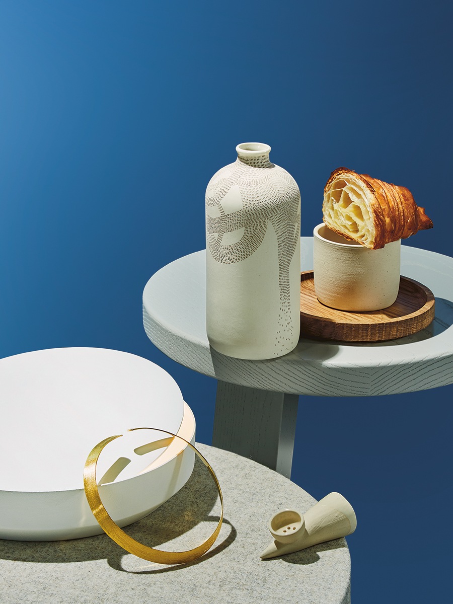 image of croissant and a variety of handmade objects