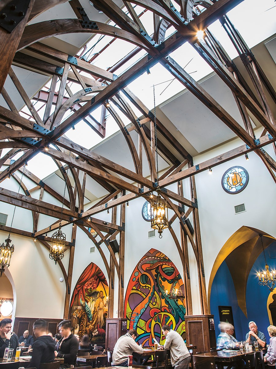 interior of a restaurant with high, vaulted ceiling