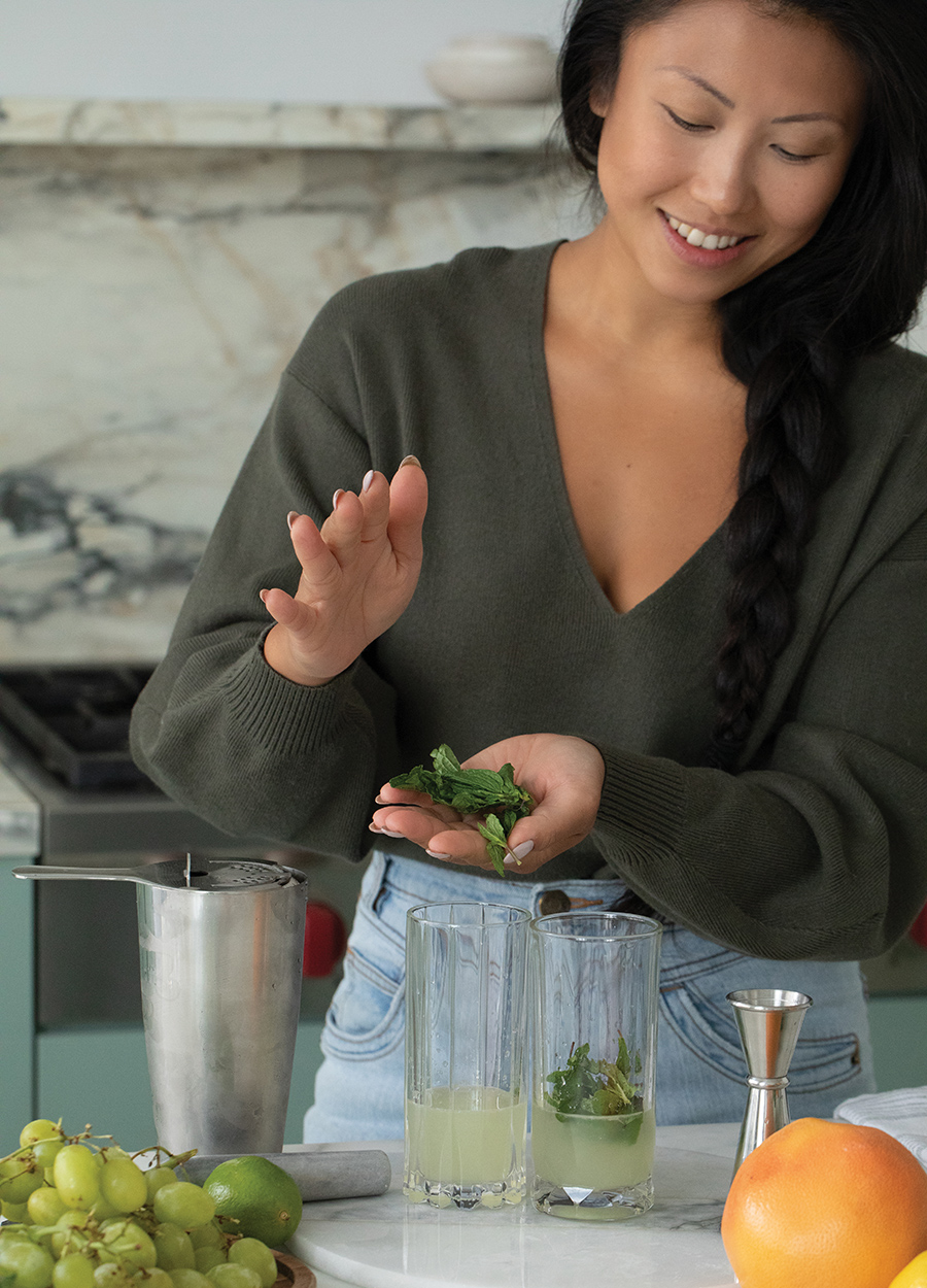 author making a cocktail