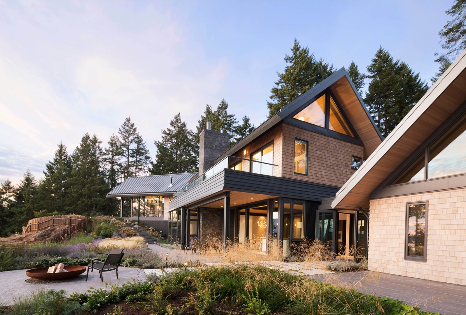 House with trees and outside fire pit